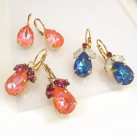 Orange earrings with fuchsia leaves and a Swarovski drop