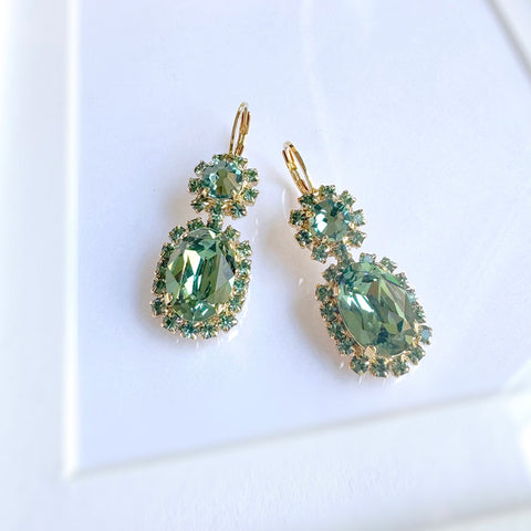 Green earrings with shiny crystals