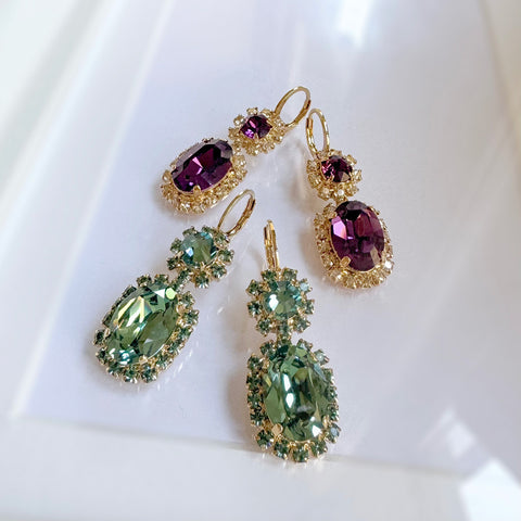 Purple earrings with shiny crystals